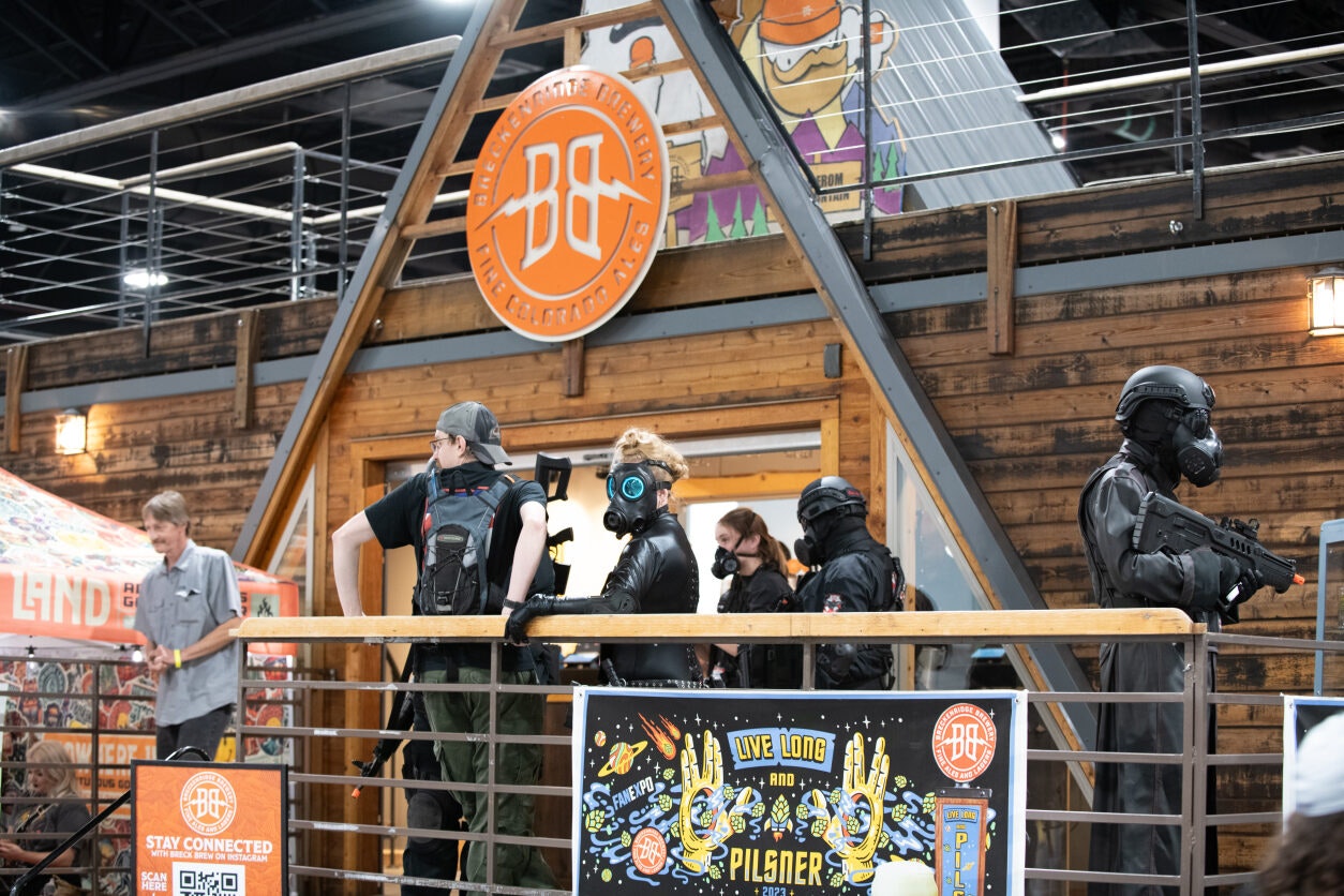 Fans dressed as characters from Resident Evil guard the Breckenridge Brewery booth