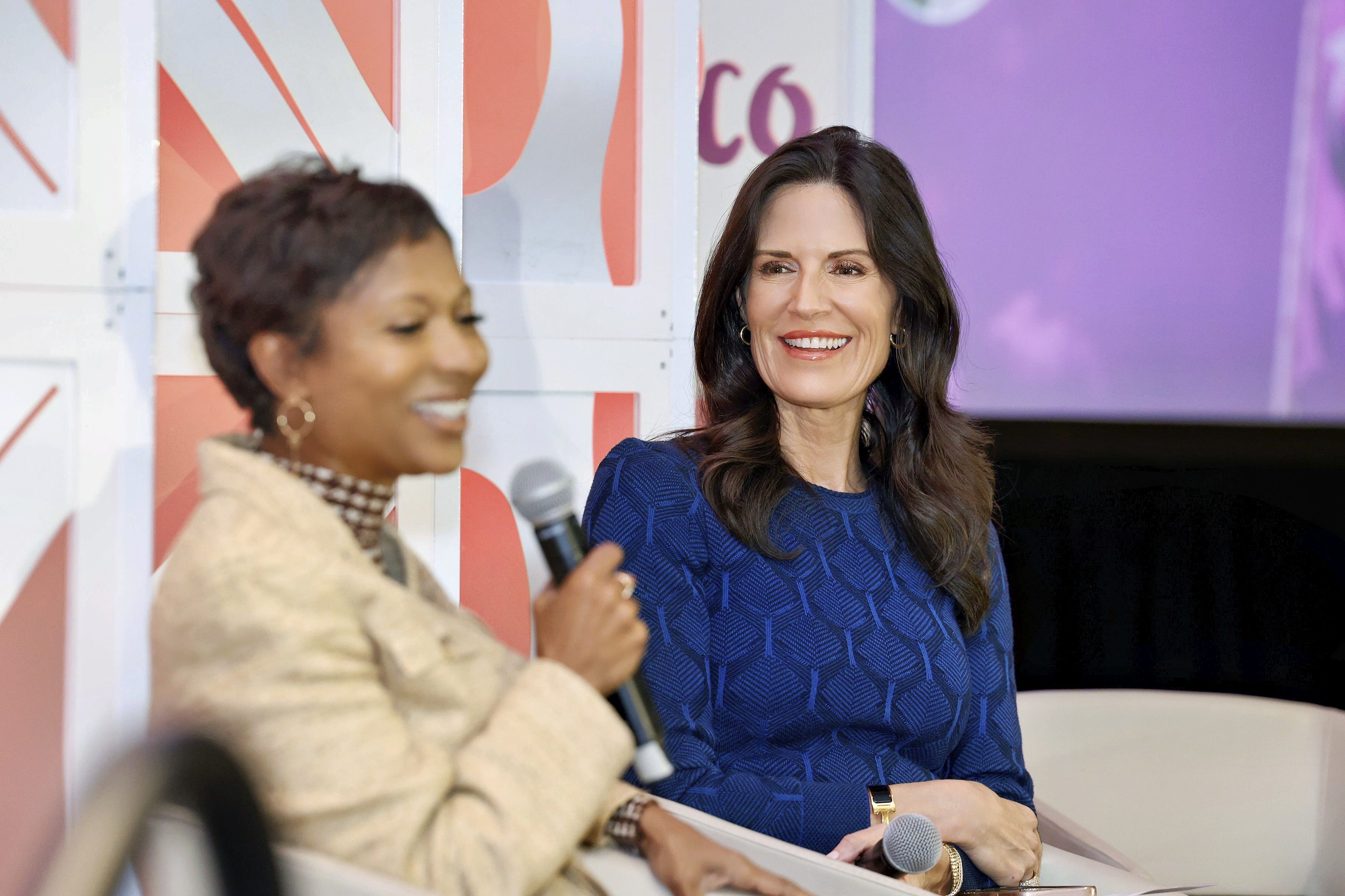 Two women on stage leading an education session at Connect Texas.