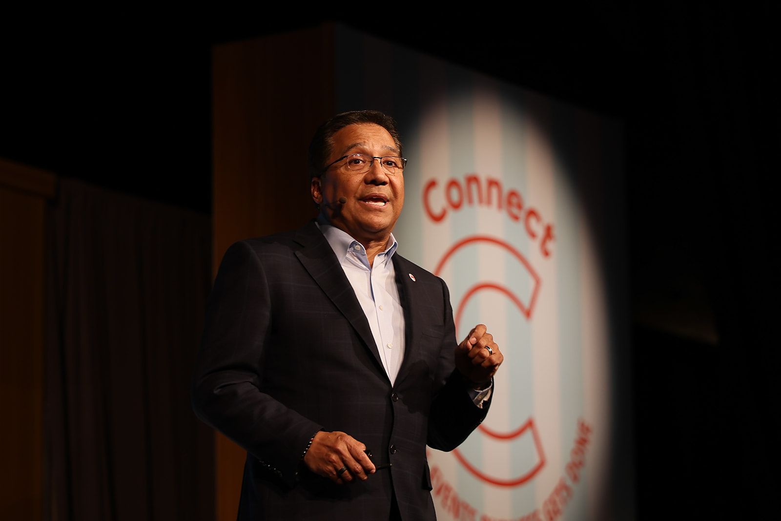 Two girls taking a photo at an interactive and visually appealing trade show booth