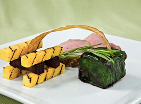 artistic plate of vegetable and meat bites