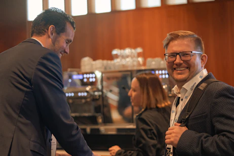 Men networking at Flame
