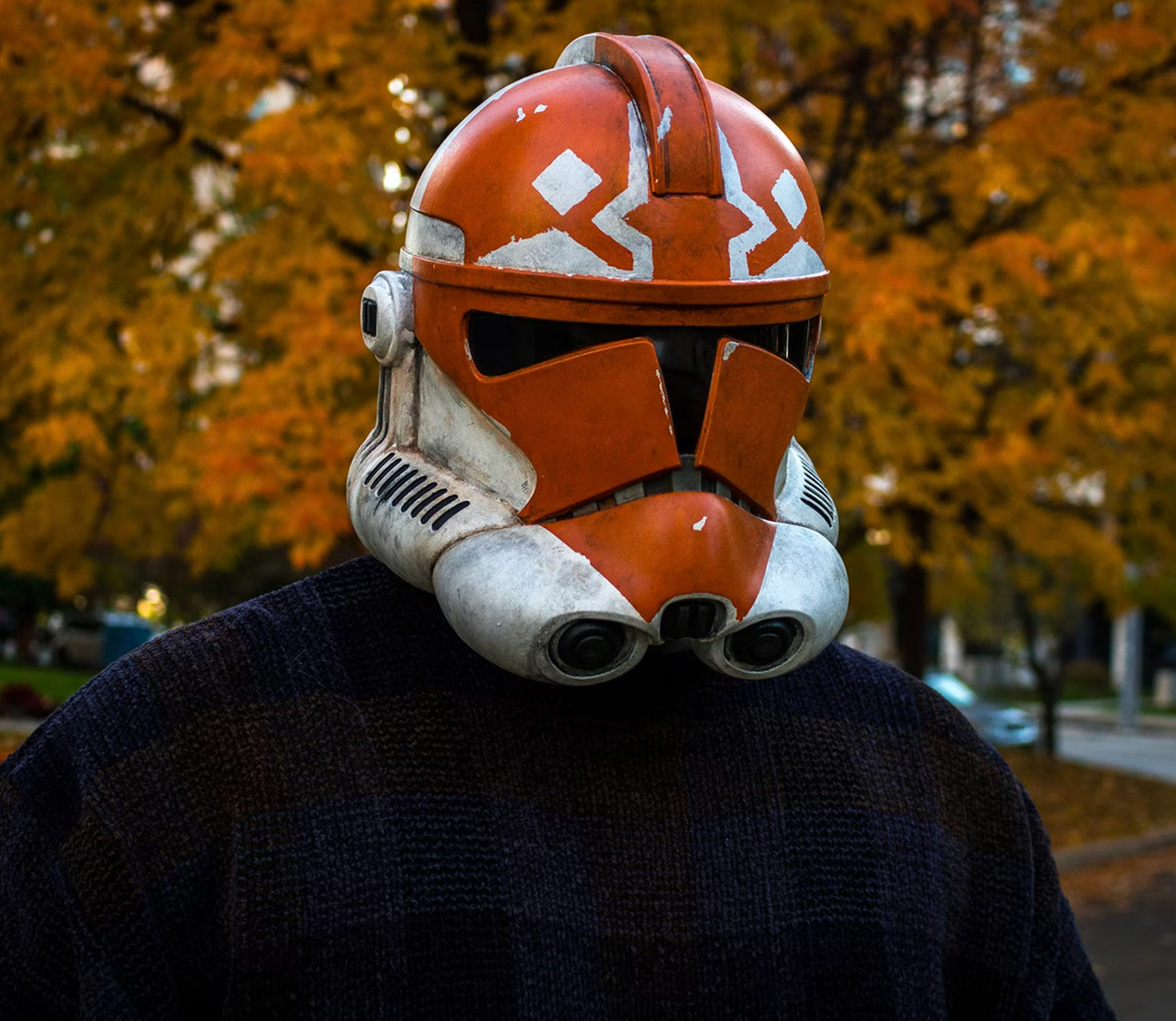A man wearing a Clone Trooper helmet