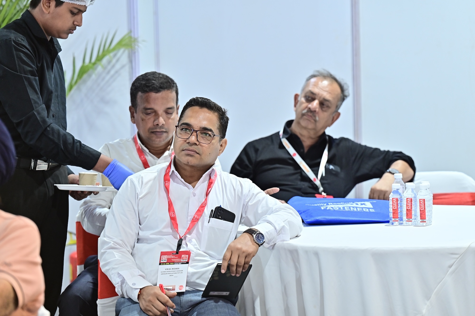 Attendee listening attentively