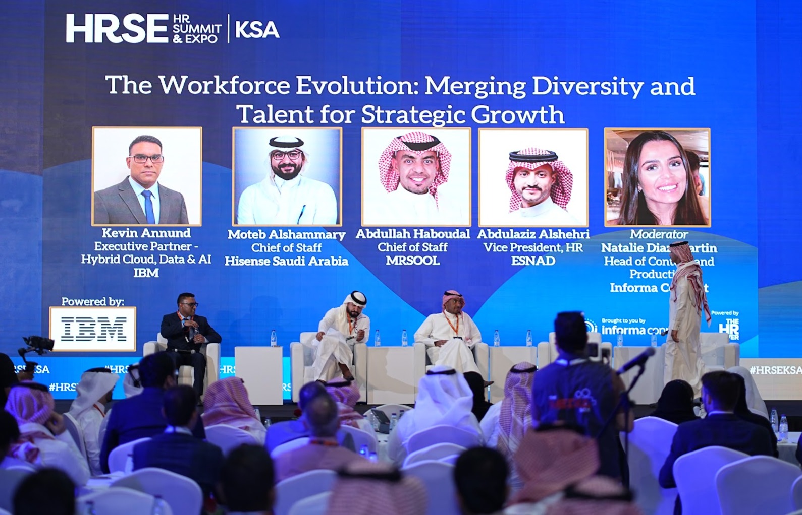 Diverse audience listening to a presenter at HRSE KSA