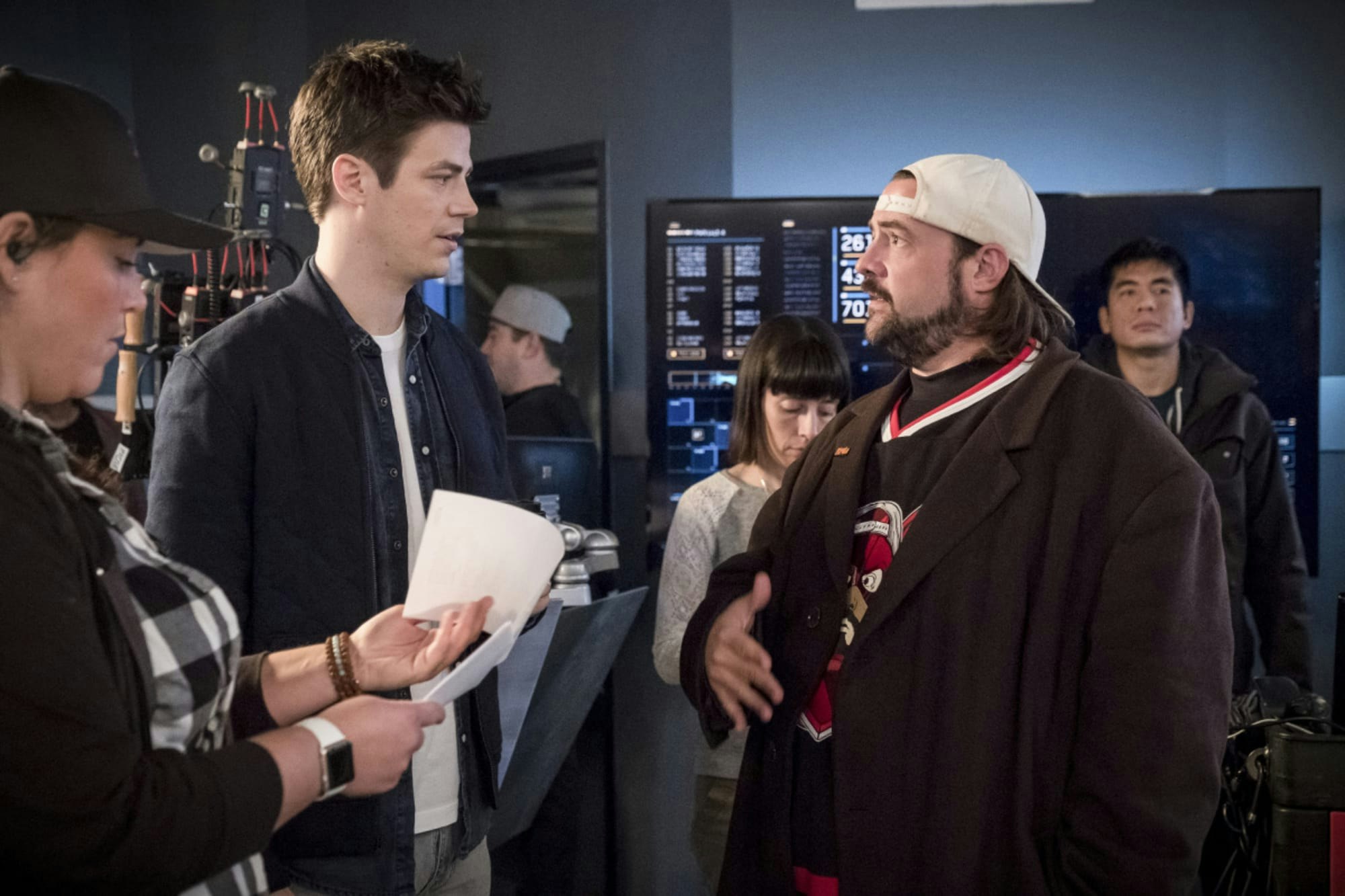 Kevin Smith talking to Barry Allen (Grant Gustin) on set of the Flash in between takes.