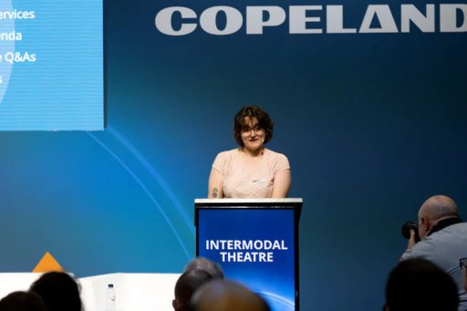 Bonnie Cliff Conference Manager giving a speech