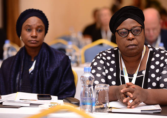 listening to presentations at Africa Sugar Conference