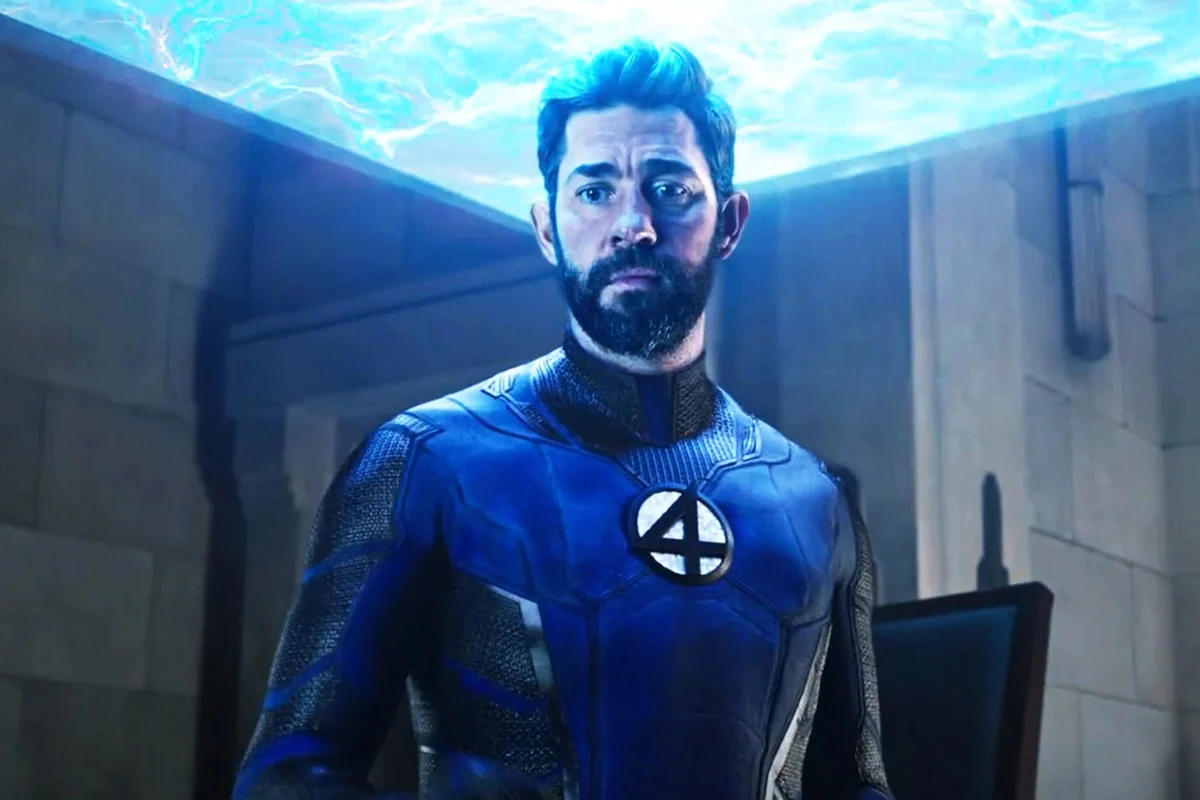 John Kraskinski as Mr Fantastic stands stoically with a serious look on his face