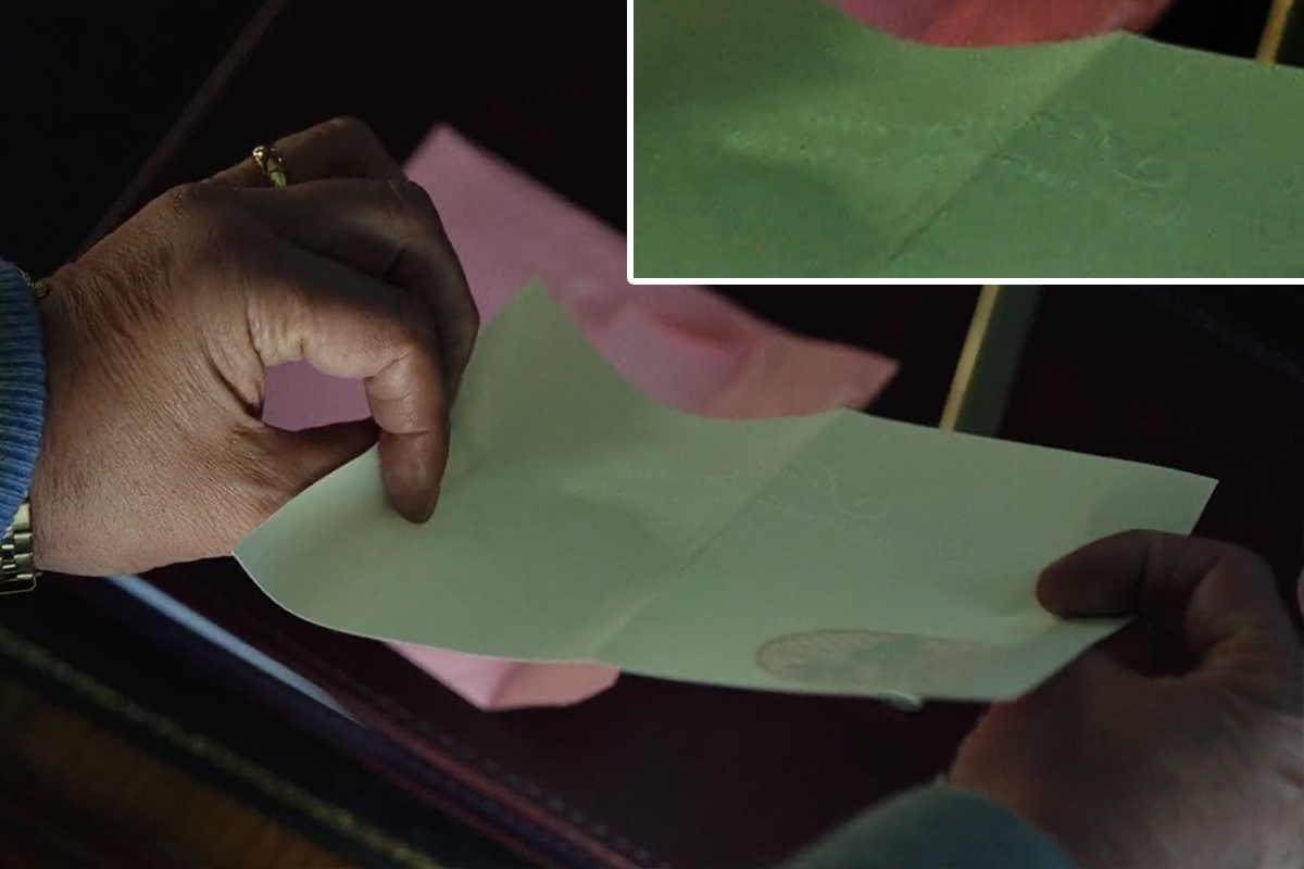 A letter with invisible ink shining in the sunlight