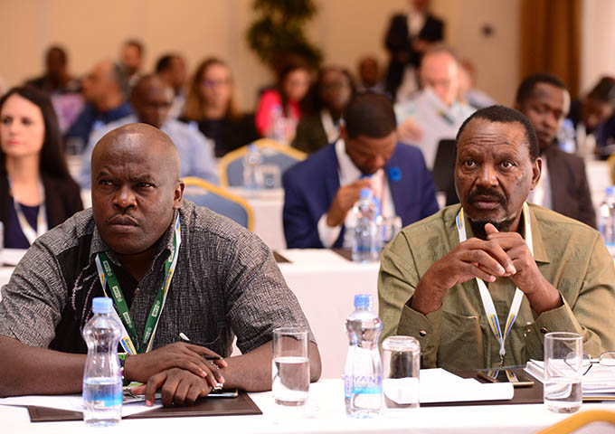 listening to presentations at Africa Sugar Conference