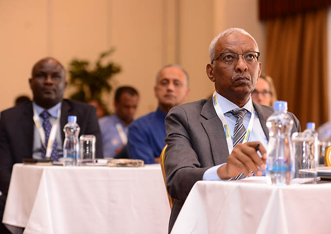 listening to presentations at Africa Sugar Conference