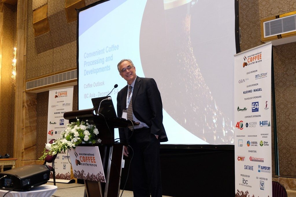 booth representatives at asia international coffee conference