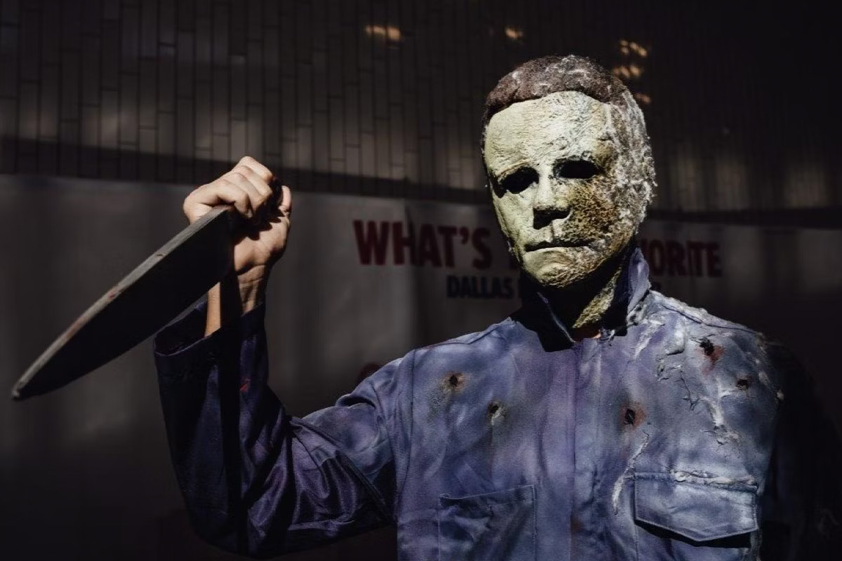 a cosplayer poses for the camera