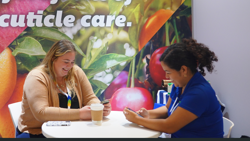 Two delegates using the event app