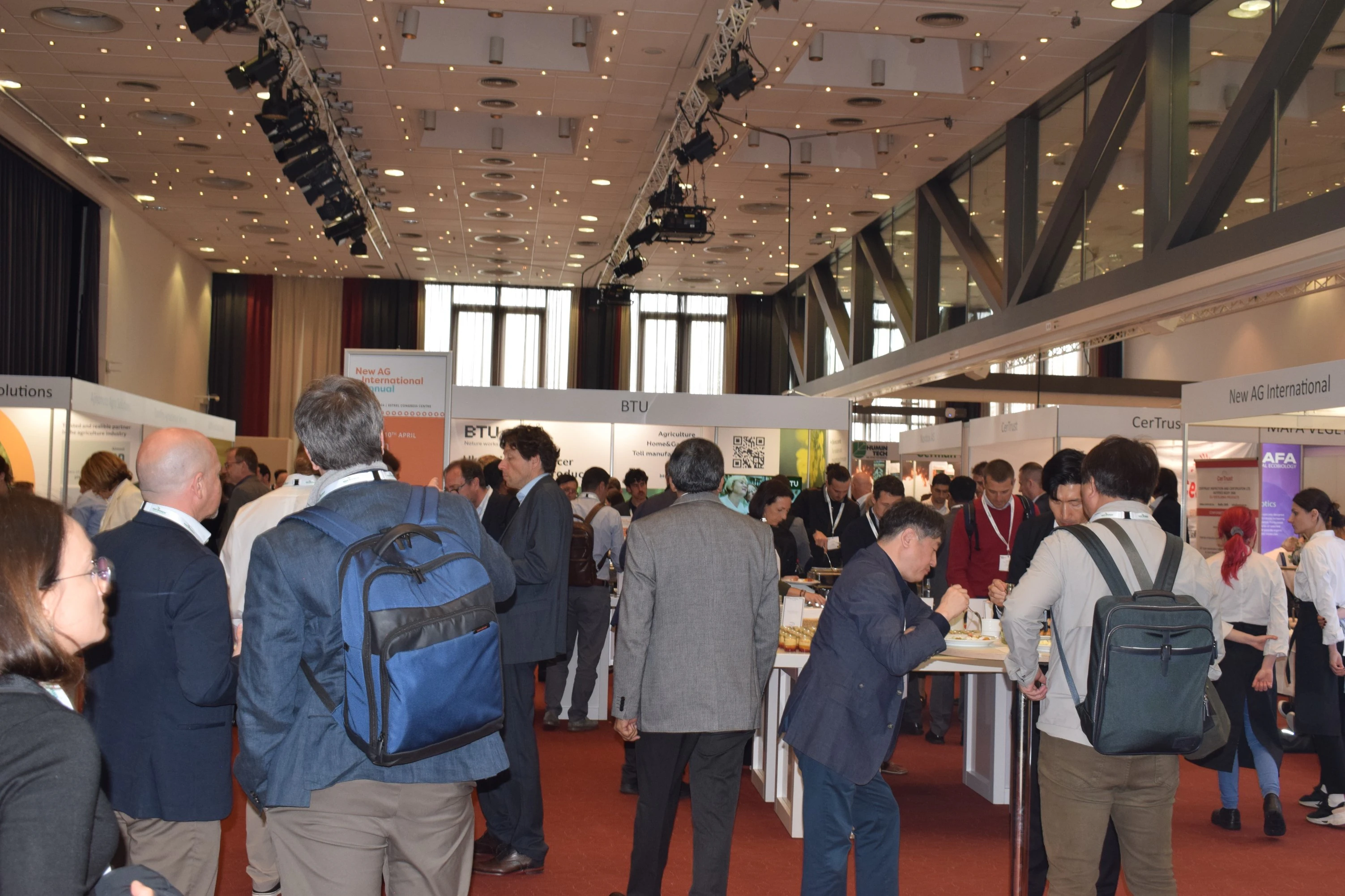 People networking at the exhibition area