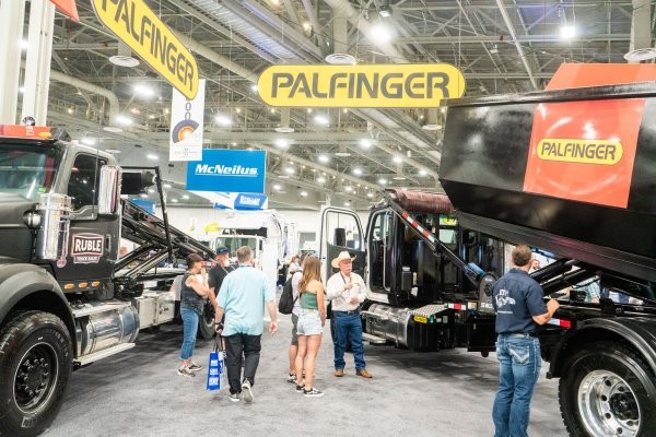 WasteExpo attendee asking a question at a conference session