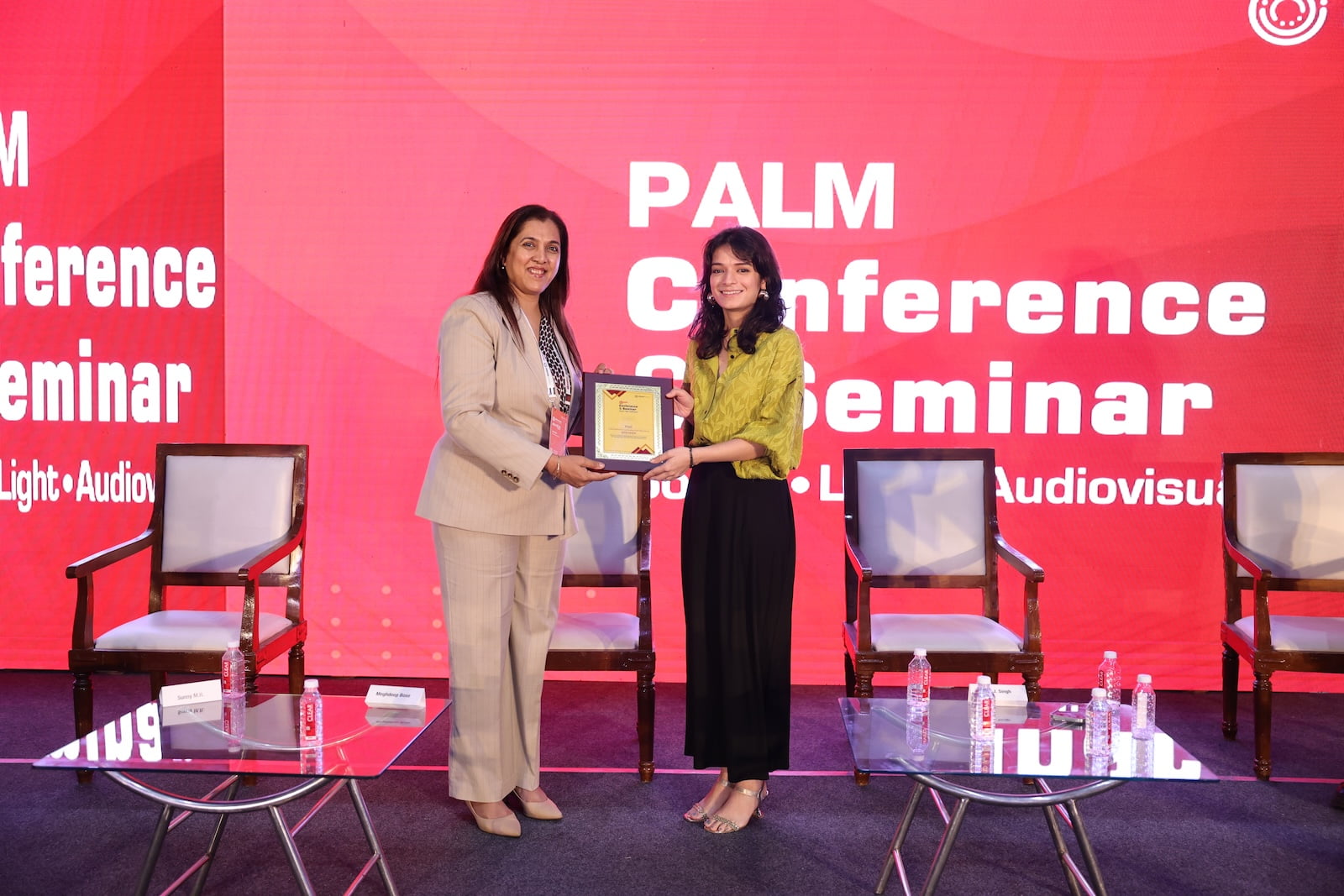 Award presentation on stage at PALM Conference & Seminar 2025