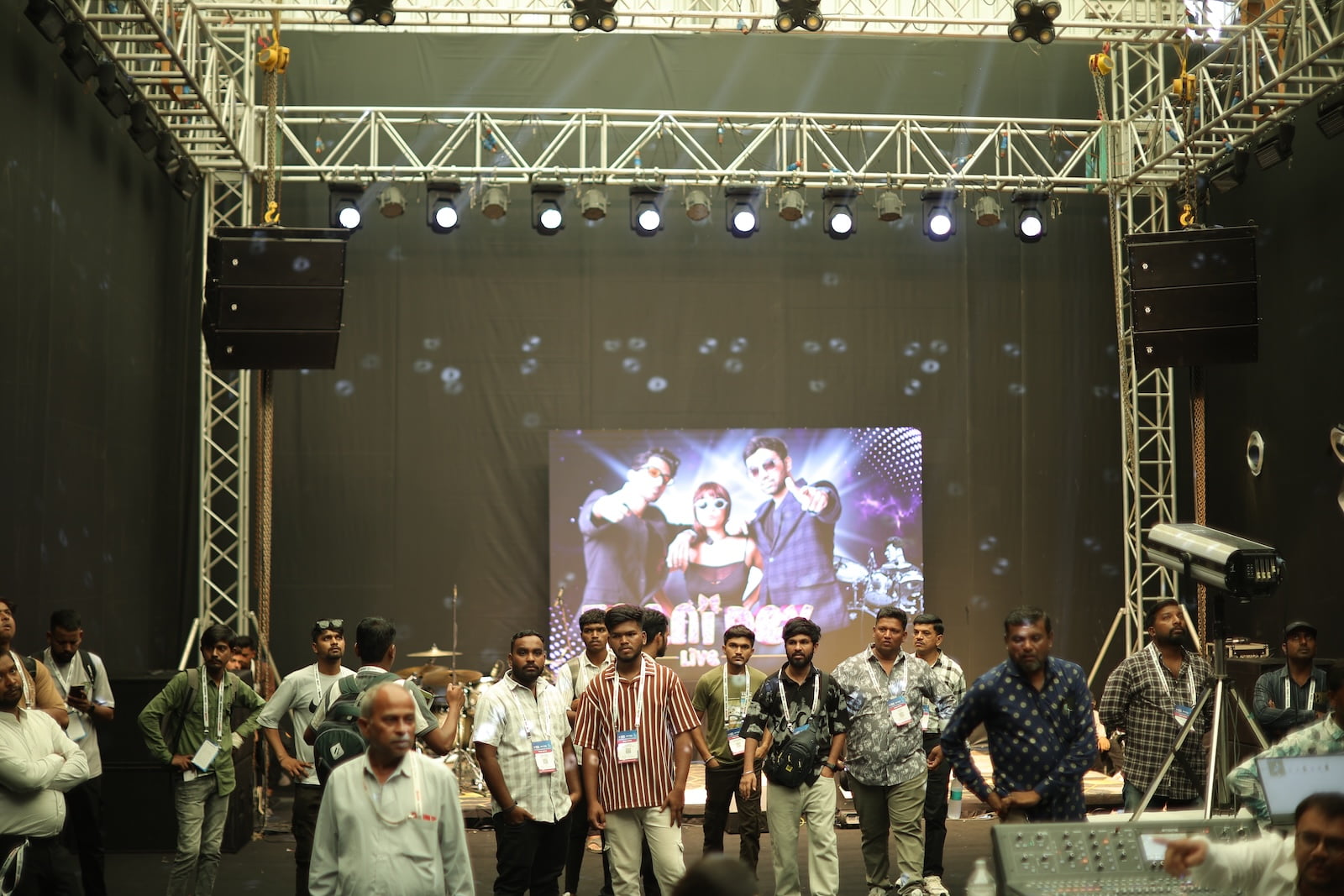 Stage performance and live sound demonstration at PALM Expo with audience interaction