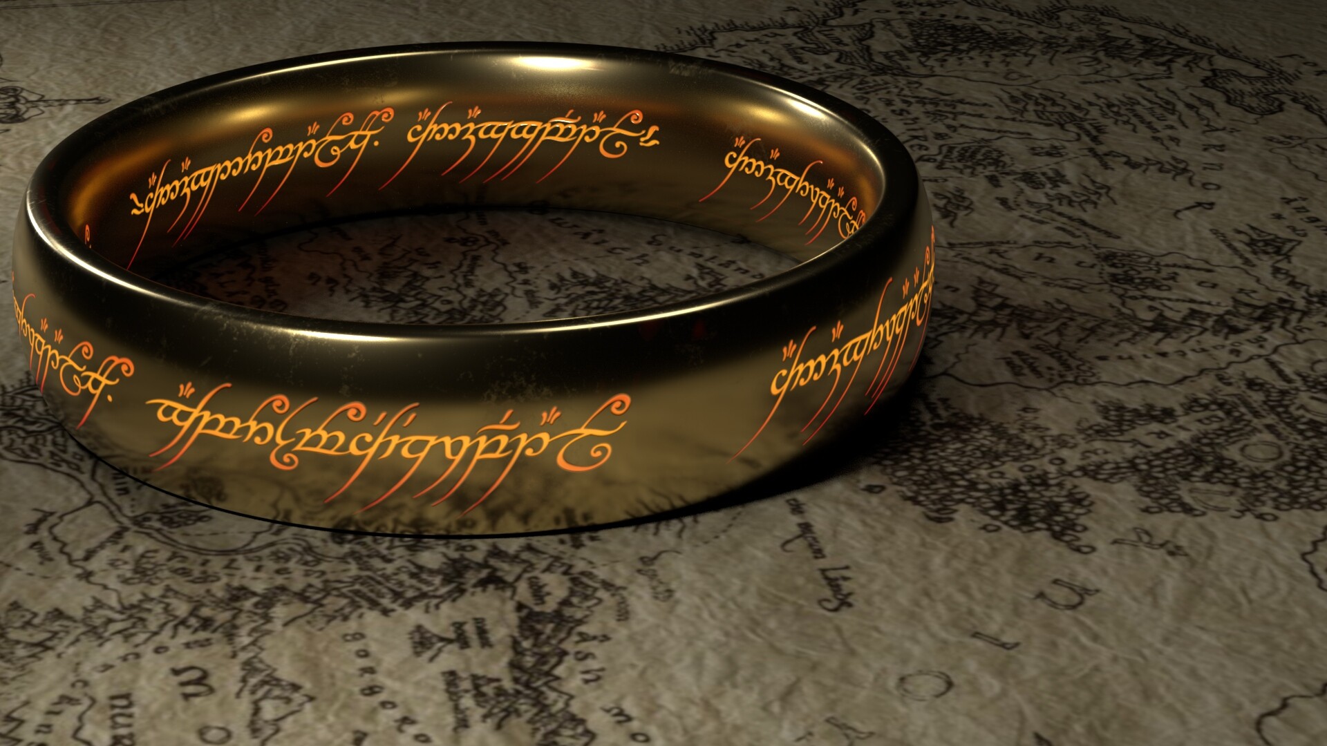 An illuminated one ring sits on top of a portion of the map of Middle Earth