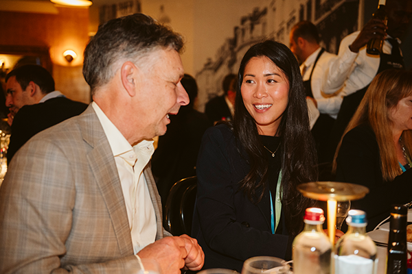 two people speaking at gala dinner