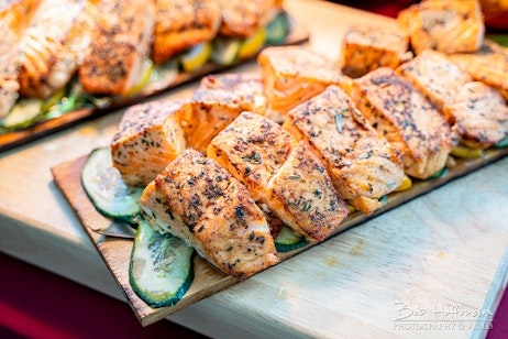 salmon pieces on cucumber slices