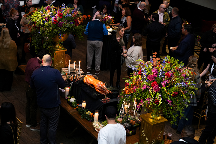 table layout at an event with a roast suckling pig