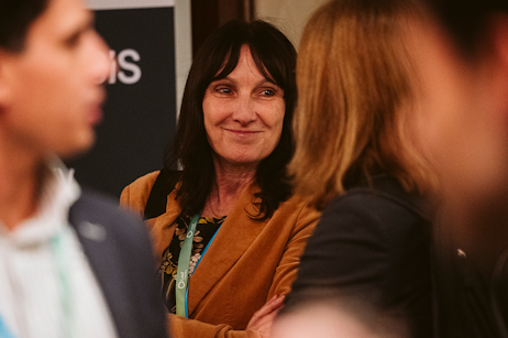 Delegates networking at World Ethanol & Biofuels 2025 in Brussels, smiling and engaging with colleagues from across 50+ countries.