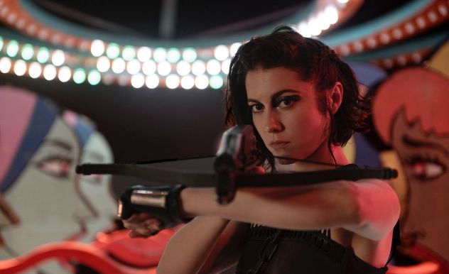 Mary Elizabeth winstead as Huntress from Birds of Prey with a bow & arrow on her arm