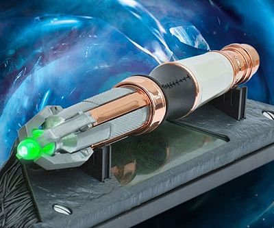 A sonic screwdriver on its own designated gray pedestal. The tip is illuminated green as it is suspended in space