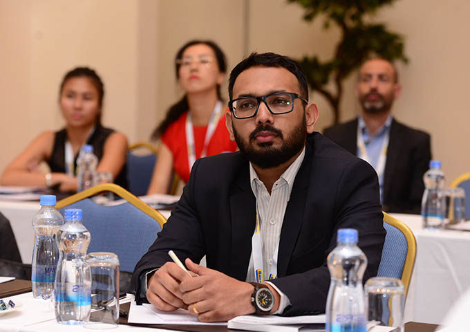 listening to presentations at Africa Sugar Conference