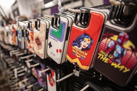 A selection of Iphone cases available for purchase - from right to left; Mandalorian, Wonder Woman, Game Boy, Harry Potter Marauder's Map