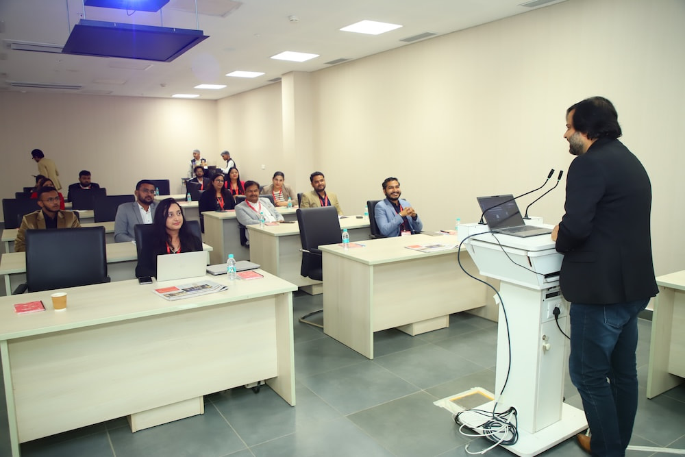 Trainer engaging with attendees in an AV education session at PALM Expo