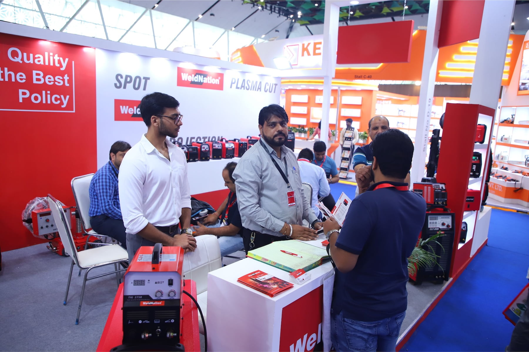 Exhibitor demonstrating welding equipment to buyers at Tools & Equipment Expo