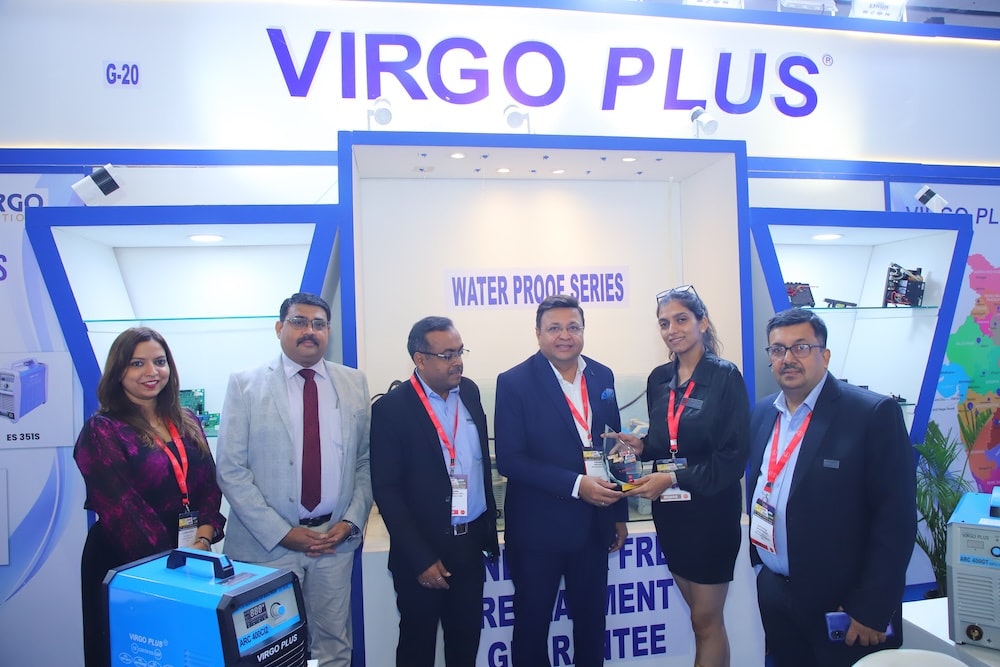 Virgo Plus representatives receive an Excellence Award at their display stand.