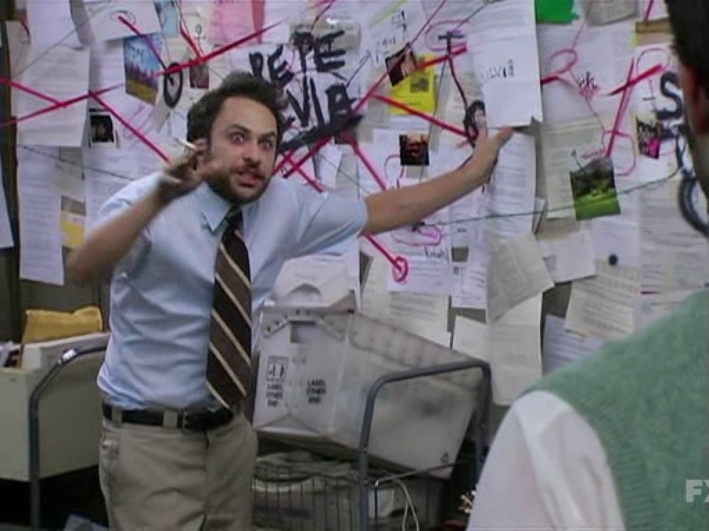 Charlie Day from It's Always Sunny in Philadelphia frantic with his conspiracy board