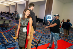 2 people posing for photos at the Waste360 Awards