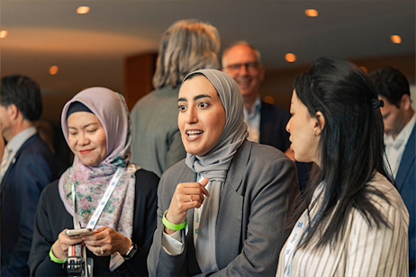 women speaking and networking