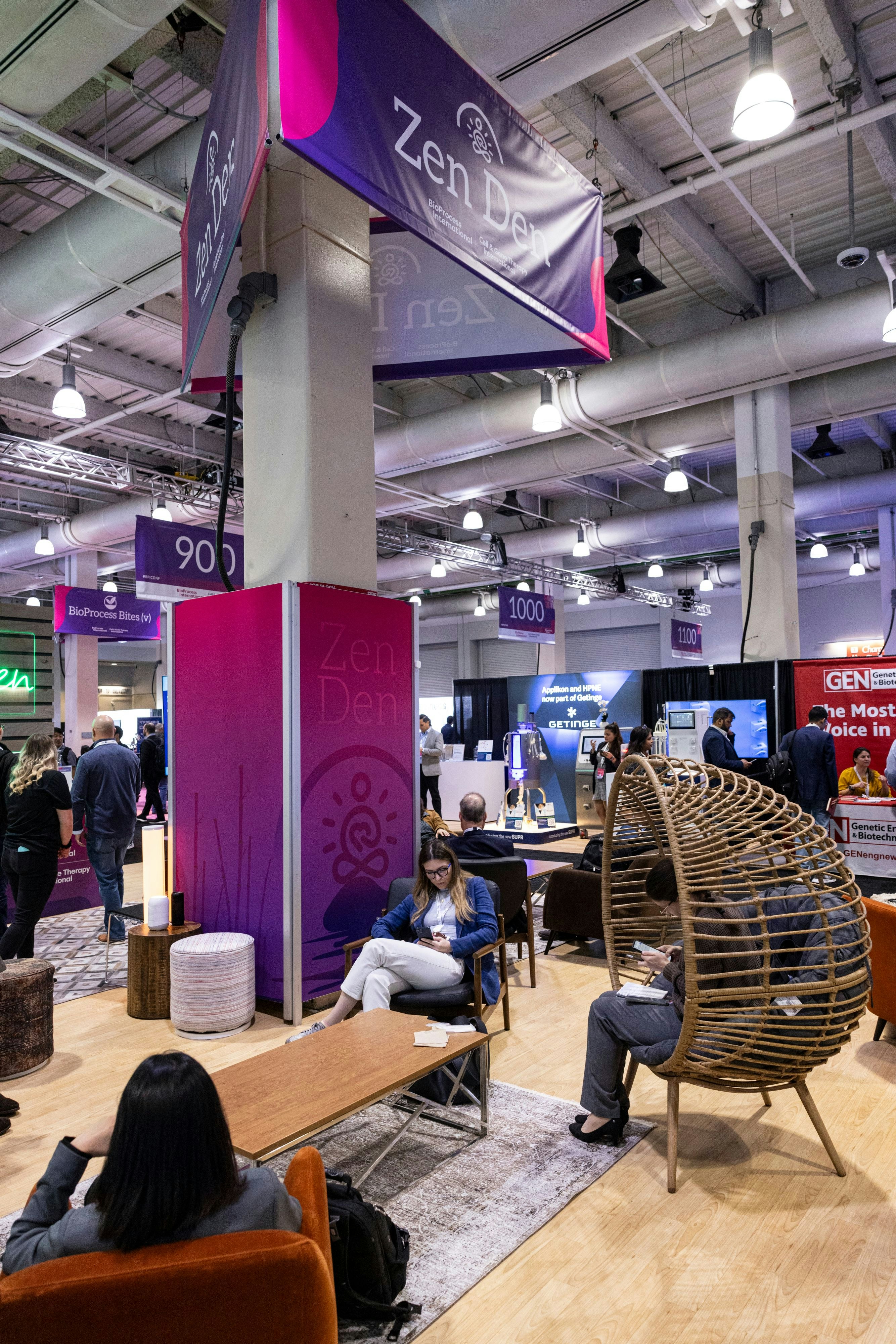 Therapeutic Developer professionals resting in the Zen Den area in the exhibit hall at BioProcess International